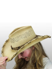 Dallas Hats HORSE SHOE 1 Hand Braided Straw Hat Natural left side view on model. If you need any assistance with this item or the purchase of this item please call us at five six one seven four eight eight eight zero one Monday through Saturday 10:00a.m EST to 8:00 p.m EST