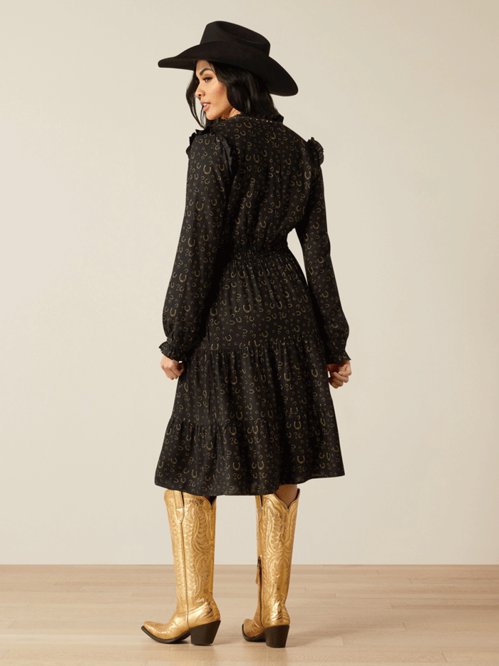 Ariat 10053967 Womens Blinged Out Dress Golden Horseshoes Print Black front. If you need any assistance with this item or the purchase of this item please call us at five six one seven four eight eight eight zero one Monday through Saturday 10:00a.m EST to 8:00 p.m EST