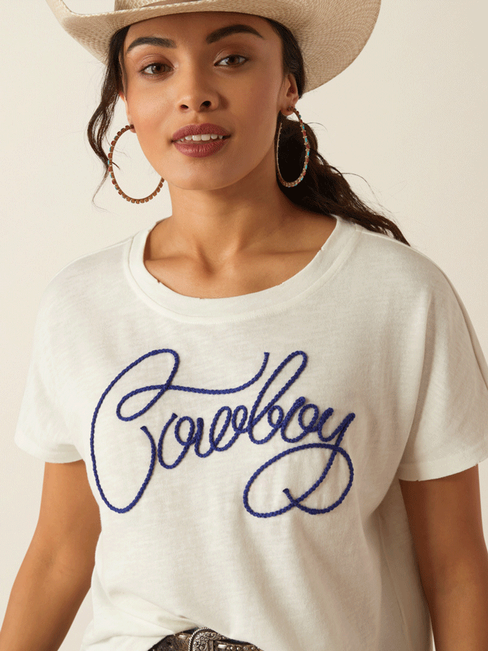 Ariat 10055139 Womens Cowboy T-Shirt Cloud Dancer front view. If you need any assistance with this item or the purchase of this item please call us at five six one seven four eight eight eight zero one Monday through Saturday 10:00a.m EST to 8:00 p.m EST