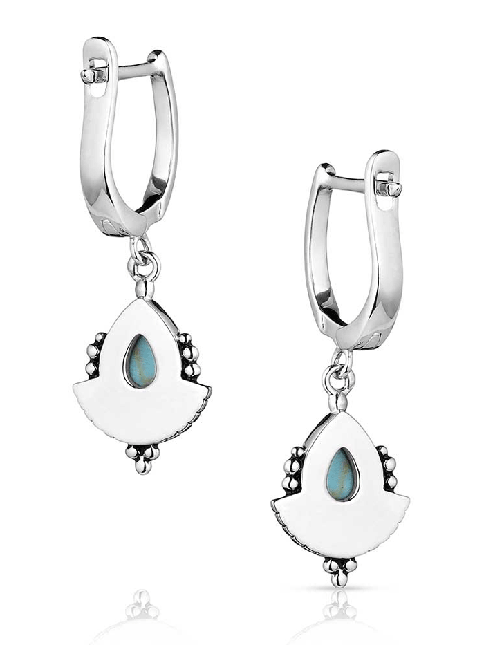 Montana Silversmiths ER5774 Womens Simple Flourish Turquoise Earrings Silver front. If you need any assistance with this item or the purchase of this item please call us at five six one seven four eight eight eight zero one Monday through Saturday 10:00a.m EST to 8:00 p.m EST