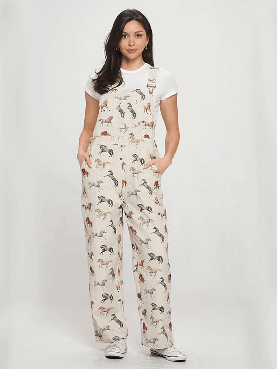 SM Wardrobe SM25022 Womens Multi Horse Print Overalls Natural front view. If you need any assistance with this item or the purchase of this item please call us at five six one seven four eight eight eight zero one Monday through Saturday 10:00a.m EST to 8:00 p.m EST