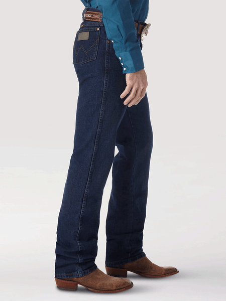 Wrangler 13MWZDD Mens Cowboy Cut Regular Fit Jeans Dark Stone side view. If you need any assistance with this item or the purchase of this item please call us at five six one seven four eight eight eight zero one Monday through Saturday 10:00a.m EST to 8:00 p.m EST