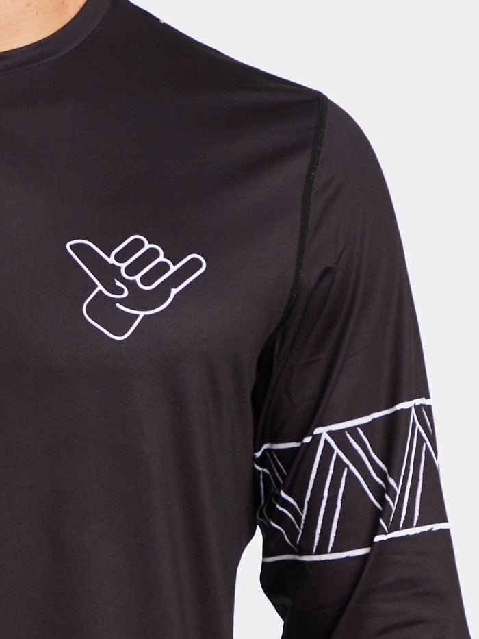 Shaka Kai Mens GET HOOKED Long Sleeve Performance Shirt Black back view. If you need any assistance with this item or the purchase of this item please call us at five six one seven four eight eight eight zero one Monday through Saturday 10:00a.m EST to 8:00 p.m EST