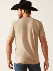 Ariat 10047841 Unisex Sendero King Cow T-Shirt Oatmeal Heather back view on male model. If you need any assistance with this item or the purchase of this item please call us at five six one seven four eight eight eight zero one Monday through Saturday 10:00a.m EST to 8:00 p.m EST