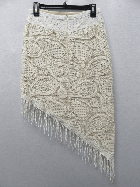 Miss Me MS0502S Womens Asymetrical Crochet Macrame Mini Skirt Natural back view. If you need any assistance with this item or the purchase of this item please call us at five six one seven four eight eight eight zero one Monday through Saturday 10:00a.m EST to 8:00 p.m EST
