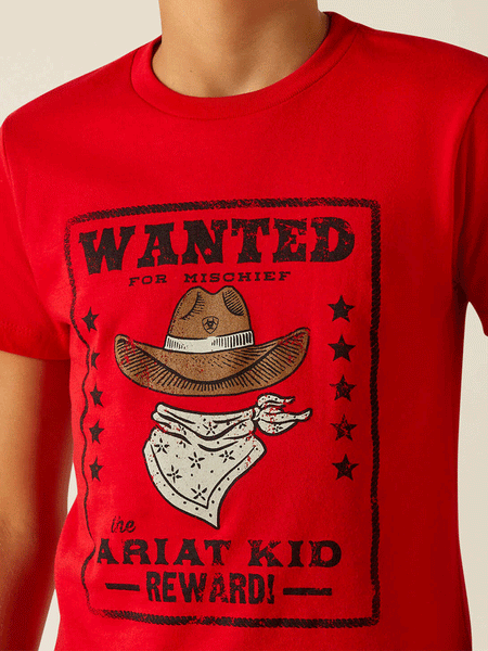 Ariat 10051429 Kids Wanted For Mischief T-Shirt Red close up view of graphic. If you need any assistance with this item or the purchase of this item please call us at five six one seven four eight eight eight zero one Monday through Saturday 10:00a.m EST to 8:00 p.m EST