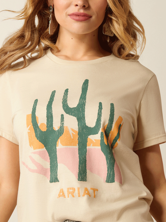 Ariat 10052545 Womens Saguro Modern Tee Natural front view. If you need any assistance with this item or the purchase of this item please call us at five six one seven four eight eight eight zero one Monday through Saturday 10:00a.m EST to 8:00 p.m EST