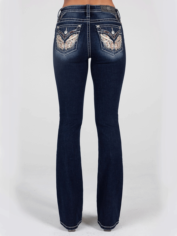 Miss Me M3080B53 Womens Mid-Rise Embroidered Wing Bootcut Jeans Dark Blue back pocket close up view. If you need any assistance with this item or the purchase of this item please call us at five six one seven four eight eight eight zero one Monday through Saturday 10:00a.m EST to 8:00 p.m EST