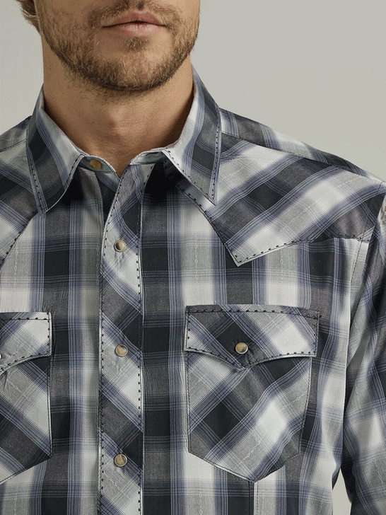 Wrangler 112330511 Mens Long Sleeve Fashion Western Snap Plaid Shirt Grisaille close up view of pocket and collar. If you need any assistance with this item or the purchase of this item please call us at five six one seven four eight eight eight zero one Monday through Saturday 10:00a.m EST to 8:00 p.m EST