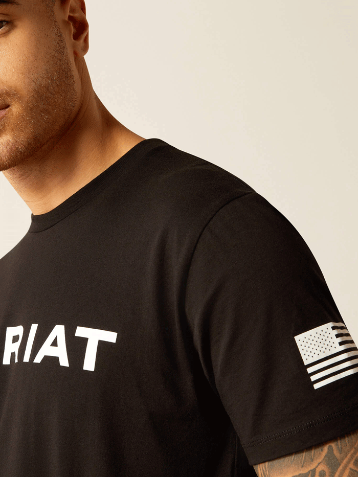 Ariat 10054197 Mens Shield Flag T-Shirt Black front view. If you need any assistance with this item or the purchase of this item please call us at five six one seven four eight eight eight zero one Monday through Saturday 10:00a.m EST to 8:00 p.m EST