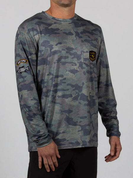 Salt Life SLM6164 Mens Rogue Long Sleeve Performance Pocket Tee Army Camo front / side view. If you need any assistance with this item or the purchase of this item please call us at five six one seven four eight eight eight zero one Monday through Saturday 10:00a.m EST to 8:00 p.m EST