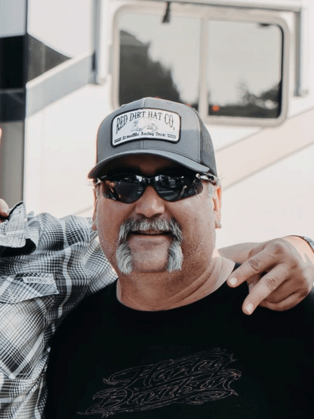 Red Dirt RDHC-101 ARMADILLO RACING TEAM Trucker Cap Black Charcoal on model. If you need any assistance with this item or the purchase of this item please call us at five six one seven four eight eight eight zero one Monday through Saturday 10:00a.m EST to 8:00 p.m EST