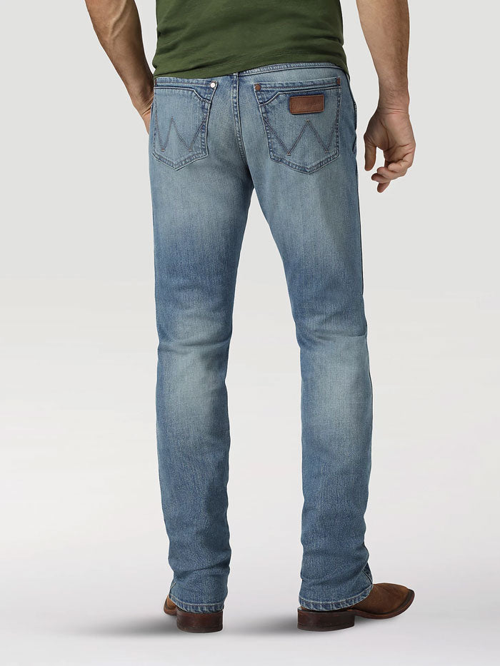 Wrangler 88MWZJK Mens Retro Slim Straight Jean Jacksboro front view. If you need any assistance with this item or the purchase of this item please call us at five six one seven four eight eight eight zero one Monday through Saturday 10:00a.m EST to 8:00 p.m EST