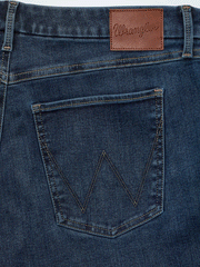 Wrangler 112359277 Womens Bespoke High Rise Bootcut Jean Lacey back pocket close up. If you need any assistance with this item or the purchase of this item please call us at five six one seven four eight eight eight zero one Monday through Saturday 10:00a.m EST to 8:00 p.m EST

