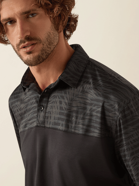 Ariat 10055071 Mens Charger 2.0 Color Block Polo Black front close up. If you need any assistance with this item or the purchase of this item please call us at five six one seven four eight eight eight zero one Monday through Saturday 10:00a.m EST to 8:00 p.m EST