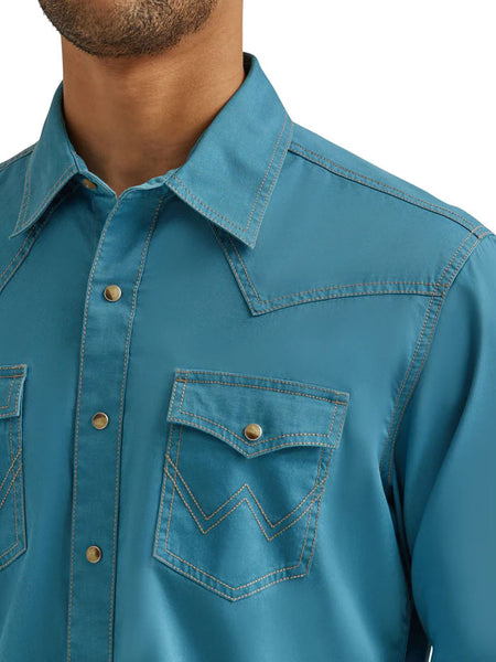 Wrangler 112344555 Mens Retro Long Sleeve Shirt Turquoise front close up.If you need any assistance with this item or the purchase of this item please call us at five six one seven four eight eight eight zero one Monday through Saturday 10:00a.m EST to 8:00 p.m EST