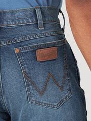 Wrangler 88MWZCB Mens Retro Slim Straight Jean Cleburn back pocket close up view. If you need any assistance with this item or the purchase of this item please call us at five six one seven four eight eight eight zero one Monday through Saturday 10:00a.m EST to 8:00 p.m EST