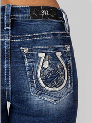 Miss Me M9183B Womens Vines And Horseshoe Bootcut Jean Dark Blue back pocket close up. If you need any assistance with this item or the purchase of this item please call us at five six one seven four eight eight eight zero one Monday through Saturday 10:00a.m EST to 8:00 p.m EST