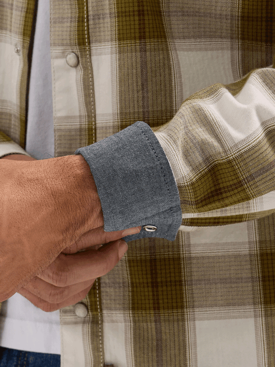 Wrangler 112365631 Mens Retro Premium Long Sleeve Plaid Shirt Olive cuff view. If you need any assistance with this item or the purchase of this item please call us at five six one seven four eight eight eight zero one Monday through Saturday 10:00a.m EST to 8:00 p.m EST