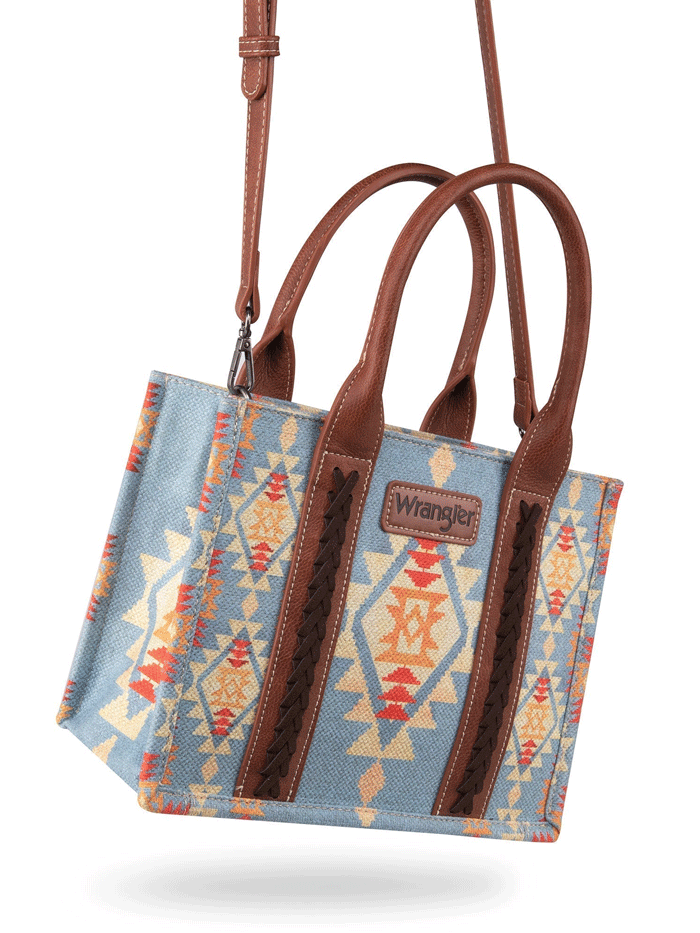 Wrangler WG2202-8120SBR Womens Southwestern Print Small Canvas Crossbody Tote Brown Light Blue front view. If you need any assistance with this item or the purchase of this item please call us at five six one seven four eight eight eight zero one Monday through Saturday 10:00a.m EST to 8:00 p.m EST

