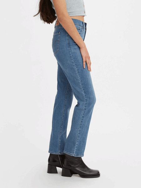 Levi's 392500082 Womens Classic Straight Fit Jean Medium Wash side view. If you need any assistance with this item or the purchase of this item please call us at five six one seven four eight eight eight zero one Monday through Saturday 10:00a.m EST to 8:00 p.m EST