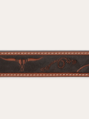 Stetson 9908500 Mens Western Icons Tooled Belt Cognac Icons close up. If you need any assistance with this item or the purchase of this item please call us at five six one seven four eight eight eight zero one Monday through Saturday 10:00a.m EST to 8:00 p.m EST