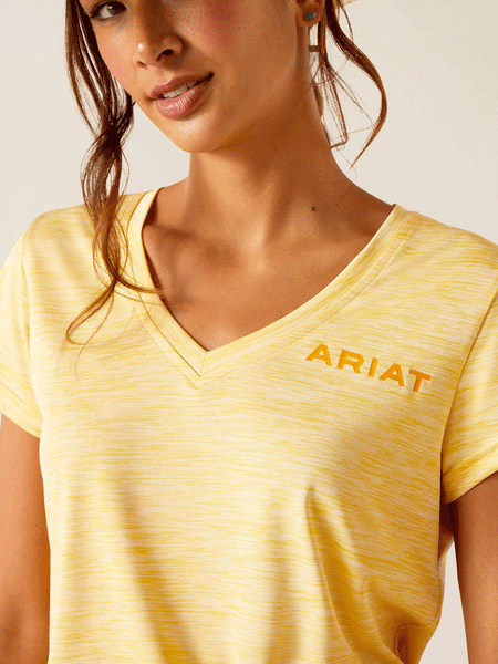 Ariat 10048738 Womens Laguna Logo Top Jojoba Yellow front close up. If you need any assistance with this item or the purchase of this item please call us at five six one seven four eight eight eight zero one Monday through Saturday 10:00a.m EST to 8:00 p.m EST