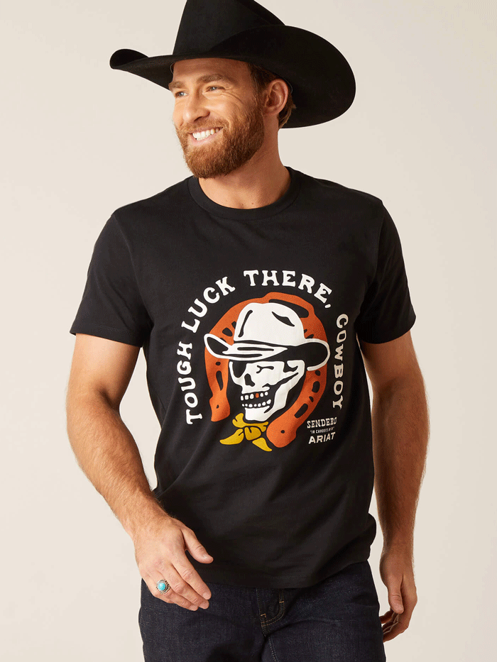 Ariat 10047839 Unisex Sendero Winking Skull T-Shirt Black front view on both male and female models. If you need any assistance with this item or the purchase of this item please call us at five six one seven four eight eight eight zero one Monday through Saturday 10:00a.m EST to 8:00 p.m EST