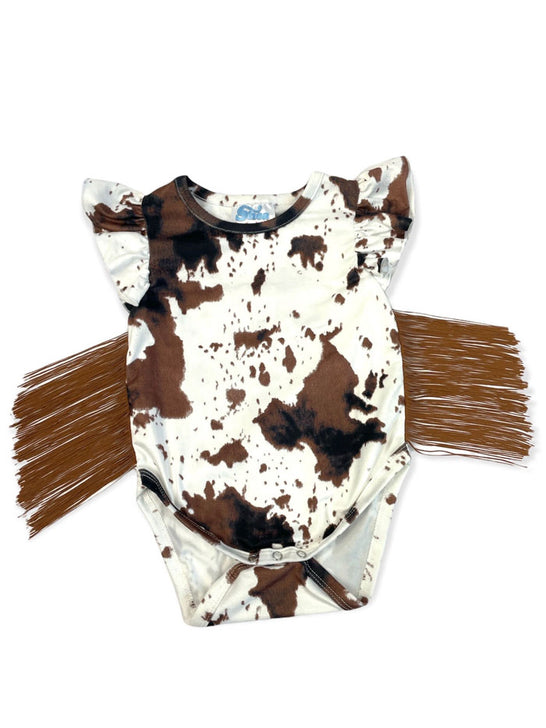 Shea Baby SBS17 Infants Cowprint With Fringe Onesie Brown And White front view. If you need any assistance with this item or the purchase of this item please call us at five six one seven four eight eight eight zero one Monday through Saturday 10:00a.m EST to 8:00 p.m EST