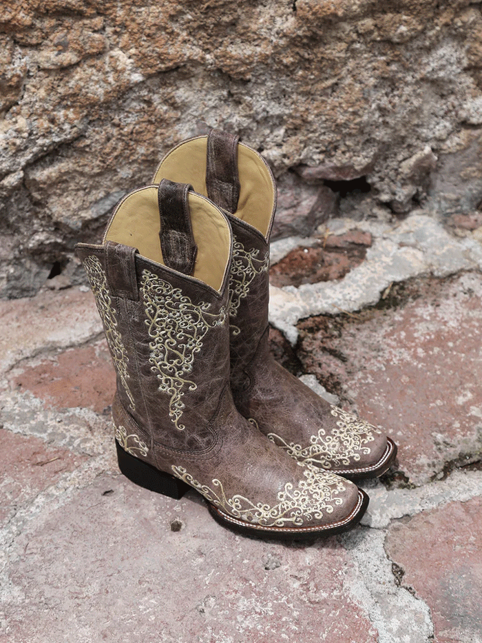 Corral A2663 Ladies Crater Bone Embroidery Square Toe Boot Brown front and side view. If you need any assistance with this item or the purchase of this item please call us at five six one seven four eight eight eight zero one Monday through Saturday 10:00a.m EST to 8:00 p.m EST