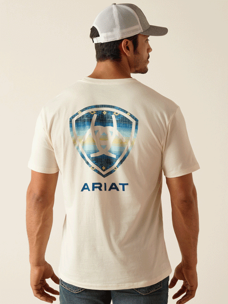 Ariat 10051454 Mens Logo Short Sleeve T-Shirt Off White back view. If you need any assistance with this item or the purchase of this item please call us at five six one seven four eight eight eight zero one Monday through Saturday 10:00a.m EST to 8:00 p.m EST
