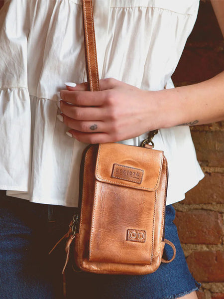 Bed Stu A450319-TNRS-X Womens Alelike Essentials Crossbody Bag Tan Rustic on model.If you need any assistance with this item or the purchase of this item please call us at five six one seven four eight eight eight zero one Monday through Saturday 10:00a.m EST to 8:00 p.m EST
