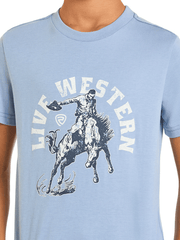 Light blue t-shirt with a graphic of a cowboy on a horse and 'Live Western' text close up view. If you need any assistance with this item or the purchase of this item please call us at five six one seven four eight eight eight zero one Monday through Saturday 10:00a.m EST to 8:00 p.m EST