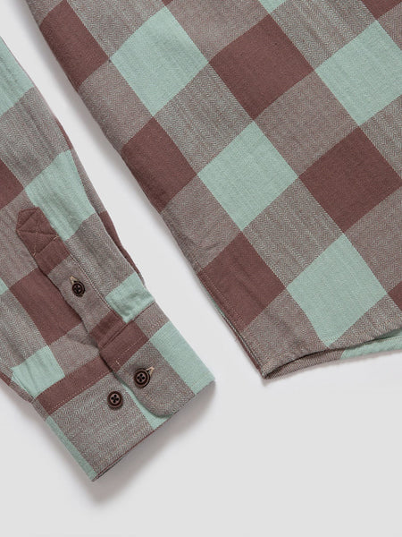 Beach and Barn HOMESTEAD-FN Woven Plaid Shirt Fern close up. If you need any assistance with this item or the purchase of this item please call us at five six one seven four eight eight eight zero one Monday through Saturday 10:00a.m EST to 8:00 p.m EST