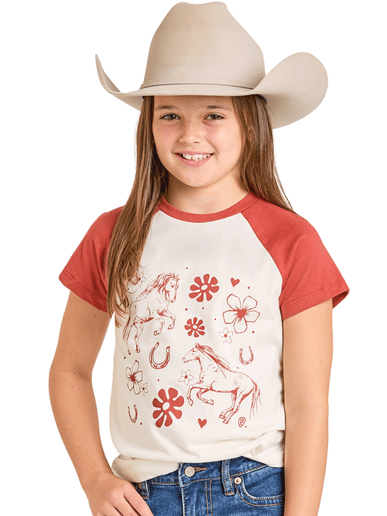 Young girl wearing a cowboy hat and a t-shirt with horse and floral designs on a white background front view. If you need any assistance with this item or the purchase of this item please call us at five six one seven four eight eight eight zero one Monday through Saturday 10:00a.m EST to 8:00 p.m EST