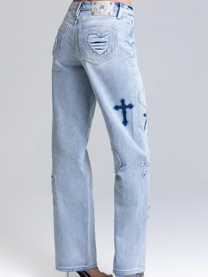Miss Me M2410SWV Womens Aryanna Heart Cross Slim Wide Light Blue front view. If you need any assistance with this item or the purchase of this item please call us at five six one seven four eight eight eight zero one Monday through Saturday 10:00a.m EST to 8:00 p.m EST

