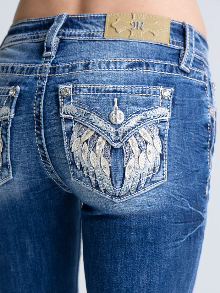 Miss Me M5082B250V Womens Mid Rise Farah Bootcut Jeans Medium Wash back close up view. If you need any assistance with this item or the purchase of this item please call us at five six one seven four eight eight eight zero one Monday through Saturday 10:00a.m EST to 8:00 p.m EST
