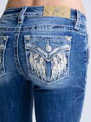 Miss Me M5082B250V Womens Mid Rise Farah Bootcut Jeans Medium Wash back close up view. If you need any assistance with this item or the purchase of this item please call us at five six one seven four eight eight eight zero one Monday through Saturday 10:00a.m EST to 8:00 p.m EST
