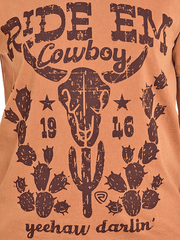 Rock & Roll Denim BW21T07952 Womens Western Graphic Tee Burnt Orange front close up. If you need any assistance with this item or the purchase of this item please call us at five six one seven four eight eight eight zero one Monday through Saturday 10:00a.m EST to 8:00 p.m EST