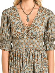 Patterned dress with puff sleeves worn by a person close up view. If you need any assistance with this item or the purchase of this item please call us at five six one seven four eight eight eight zero one Monday through Saturday 10:00a.m EST to 8:00 p.m EST