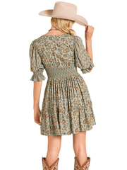Woman wearing a floral dress, wide-brimmed hat, and cowboy boots on a white background back view. If you need any assistance with this item or the purchase of this item please call us at five six one seven four eight eight eight zero one Monday through Saturday 10:00a.m EST to 8:00 p.m EST
