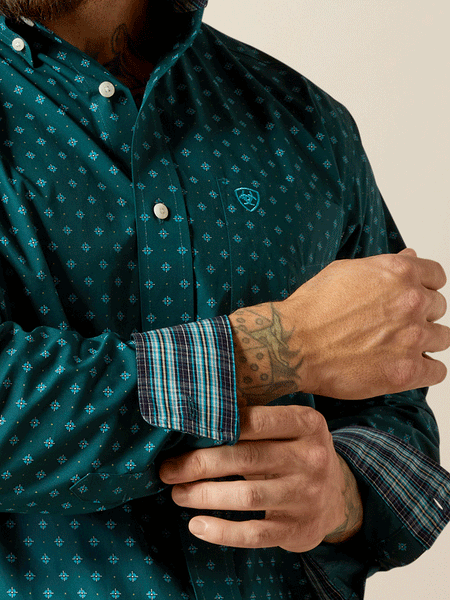 Ariat 10052374 Mens Wrinkle Free Gunnar Classic Fit Shirt Deep Teal cuff close up view. If you need any assistance with this item or the purchase of this item please call us at five six one seven four eight eight eight zero one Monday through Saturday 10:00a.m EST to 8:00 p.m EST