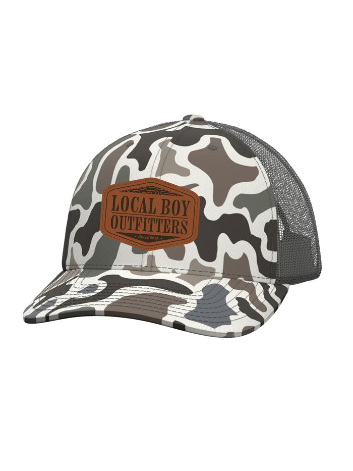 Local Boy Outfitters L3000373-LCF Mens Topo Leather Trucker Hat Localflage front view. If you need any assistance with this item or the purchase of this item please call us at five six one seven four eight eight eight zero one Monday through Saturday 10:00a.m EST to 8:00 p.m EST
