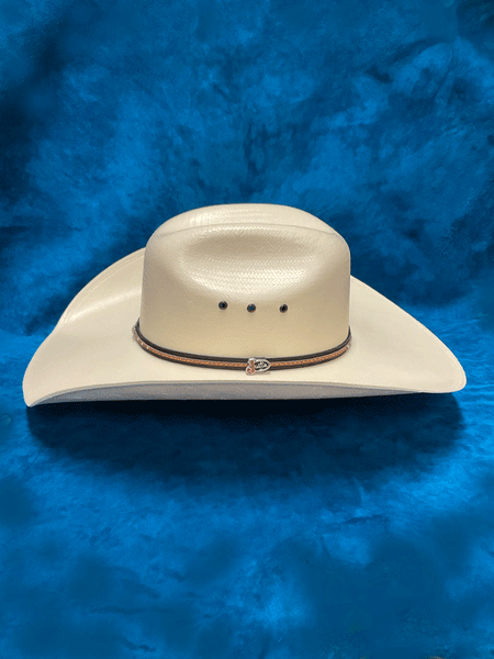 Justin JS1330BELT4404 20X BELTON TOYO Straw Western Hat Ivory side view. If you need any assistance with this item or the purchase of this item please call us at five six one seven four eight eight eight zero one Monday through Saturday 10:00a.m EST to 8:00 p.m EST