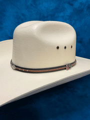Justin JS1330BELT4404 20X BELTON TOYO Straw Western Hat Ivory band close up. If you need any assistance with this item or the purchase of this item please call us at five six one seven four eight eight eight zero one Monday through Saturday 10:00a.m EST to 8:00 p.m EST