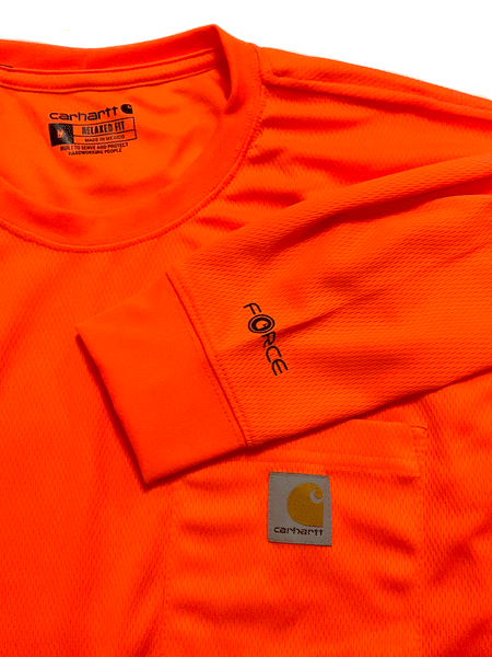 Carhartt 100494-824 Mens Force Color Enhanced Long Sleeve T-Shirt Brite Orange front close up-pocket, sleeve and collar. If you need any assistance with this item or the purchase of this item please call us at five six one seven four eight eight eight zero one Monday through Saturday 10:00a.m EST to 8:00 p.m EST