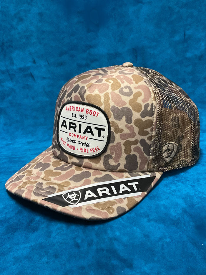 Ariat A3000871156 Duck Patch Cap Camo side / front view. If you need any assistance with this item or the purchase of this item please call us at five six one seven four eight eight eight zero one Monday through Saturday 10:00a.m EST to 8:00 p.m EST