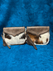 Tony Lama 2192810 Womens Brindle Hair On Wristlet Bag Brown front view of available hair on patterns. If you need any assistance with this item or the purchase of this item please call us at five six one seven four eight eight eight zero one Monday through Saturday 10:00a.m EST to 8:00 p.m EST