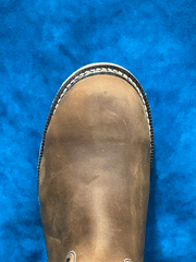 Thorogood 804-3320 Mens Pull On Waterproof Safety Toe Wellington Boot Crazyhorse Brown toe view from above. If you need any assistance with this item or the purchase of this item please call us at five six one seven four eight eight eight zero one Monday through Saturday 10:00a.m EST to 8:00 p.m EST