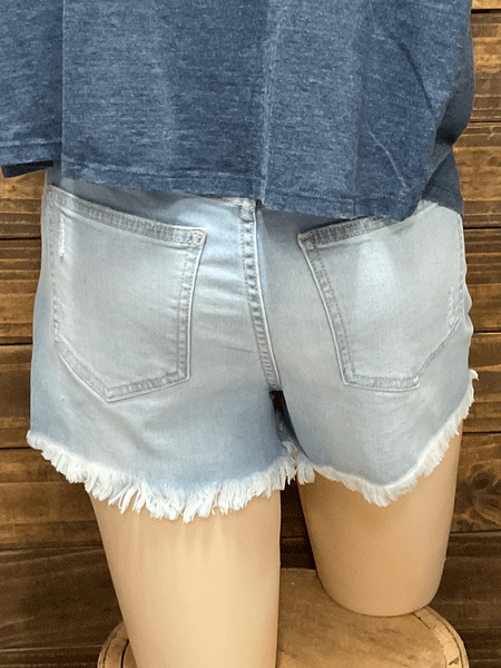 Sneak Peek SP-S7393ML Womens Frayed Hem High Rise Denim Shorts Light Blue back view on mannequin. If you need any assistance with this item or the purchase of this item please call us at five six one seven four eight eight eight zero one Monday through Saturday 10:00a.m EST to 8:00 p.m EST